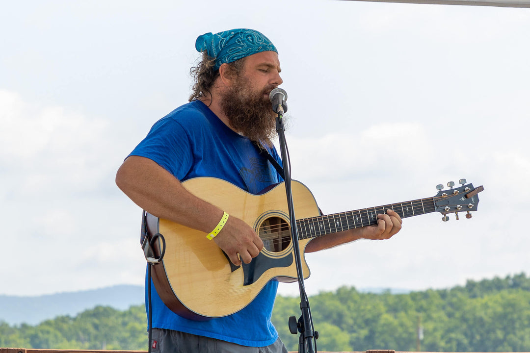 Singer at a festival at Meadowbrooke Gourds.