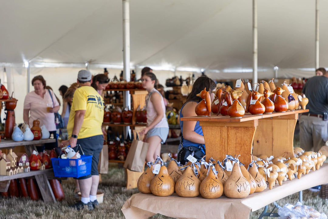 OOPS tent at a festival at Meadowbrooke Gourds.