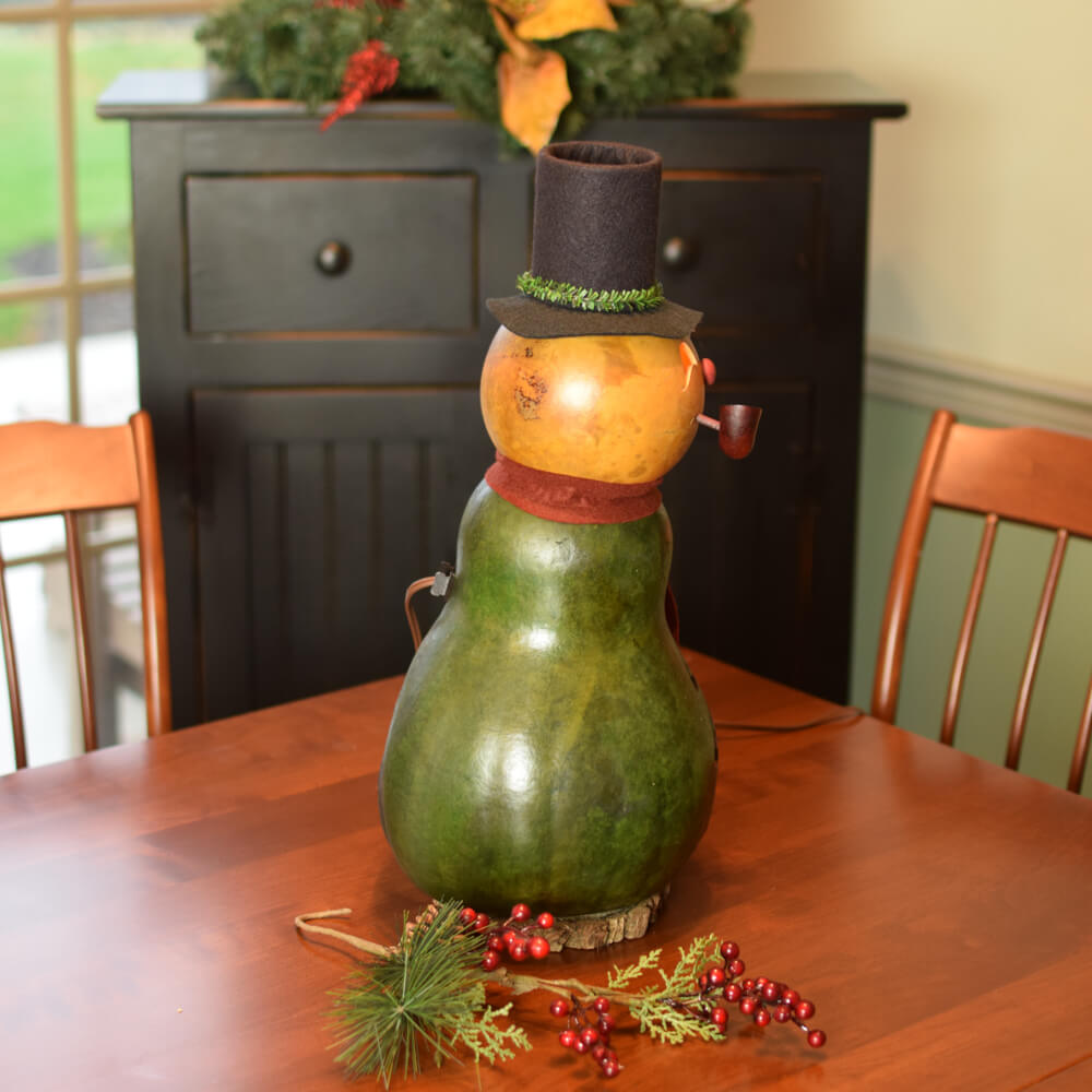 Large Lit Pinewood Snowman Gourd at Meadowbrooke Gourds. Right Side View