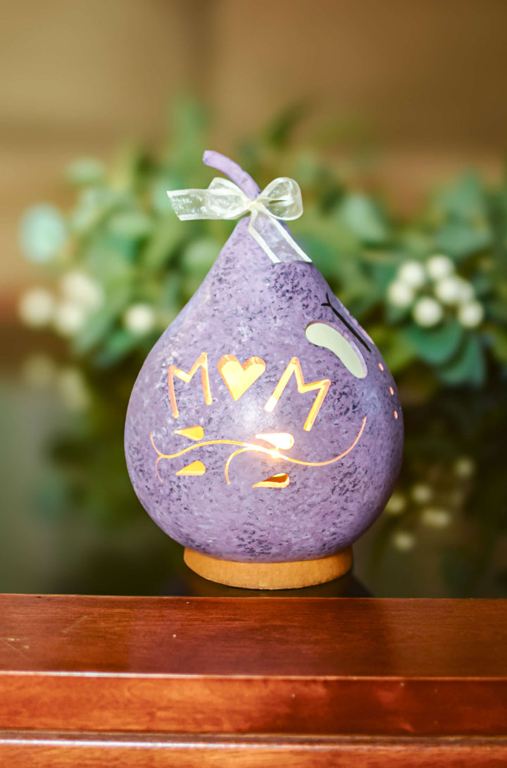 Mom gourd with a butterfly at Meadowbrooke Gourds