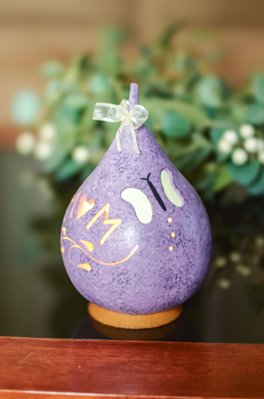 Mom gourd with a butterfly at Meadowbrooke Gourds