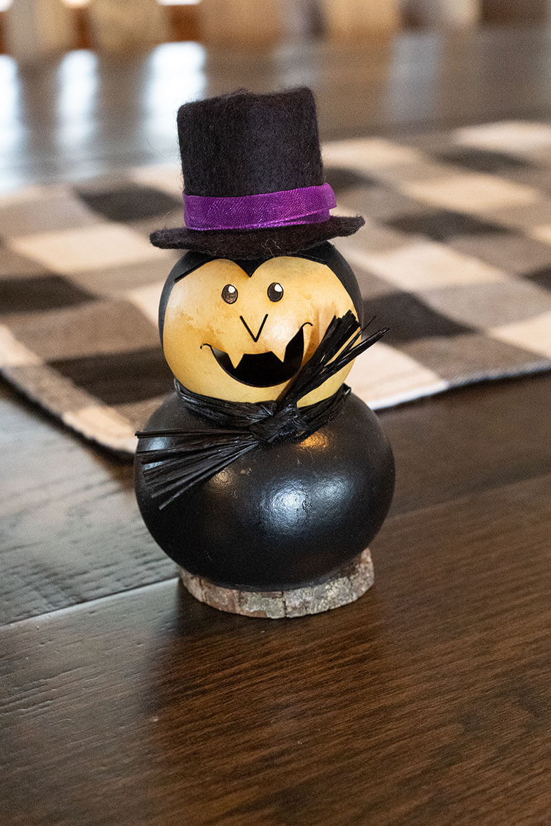 TIny Cinder Warlock Gourd at Meadowbrooke Gourds. 