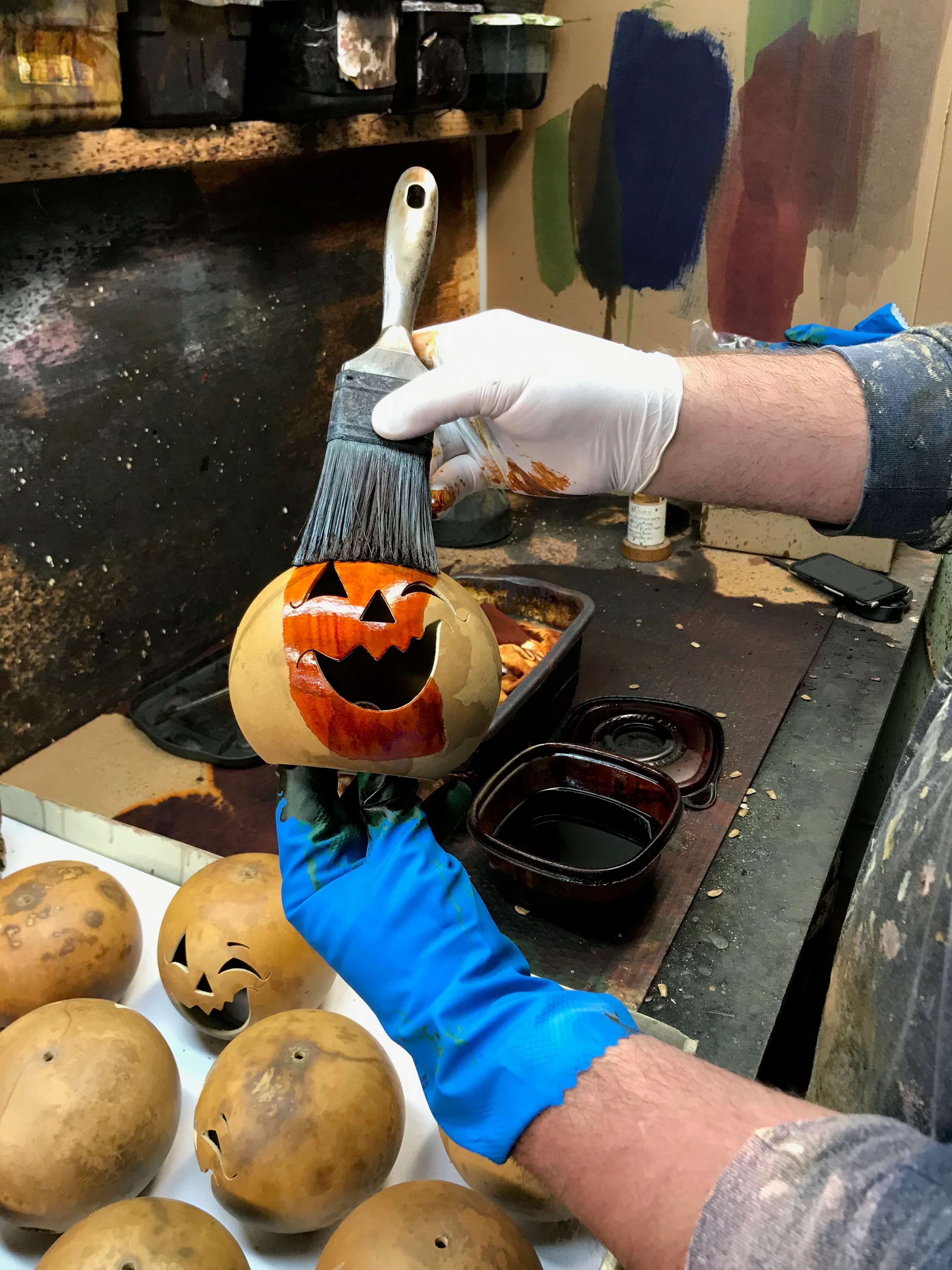 Employee dying a jack o lantern