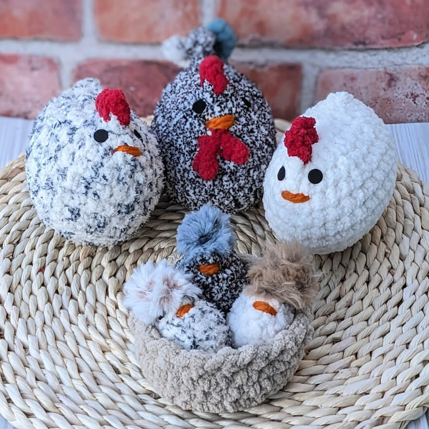 Three small chenille chicks in a chenille basket and three larger chenille chickens