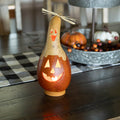 Casper Jack Natural Ghost and Orange Jack-O-Lantern Gourd at Meadowbrooke Gourds. 