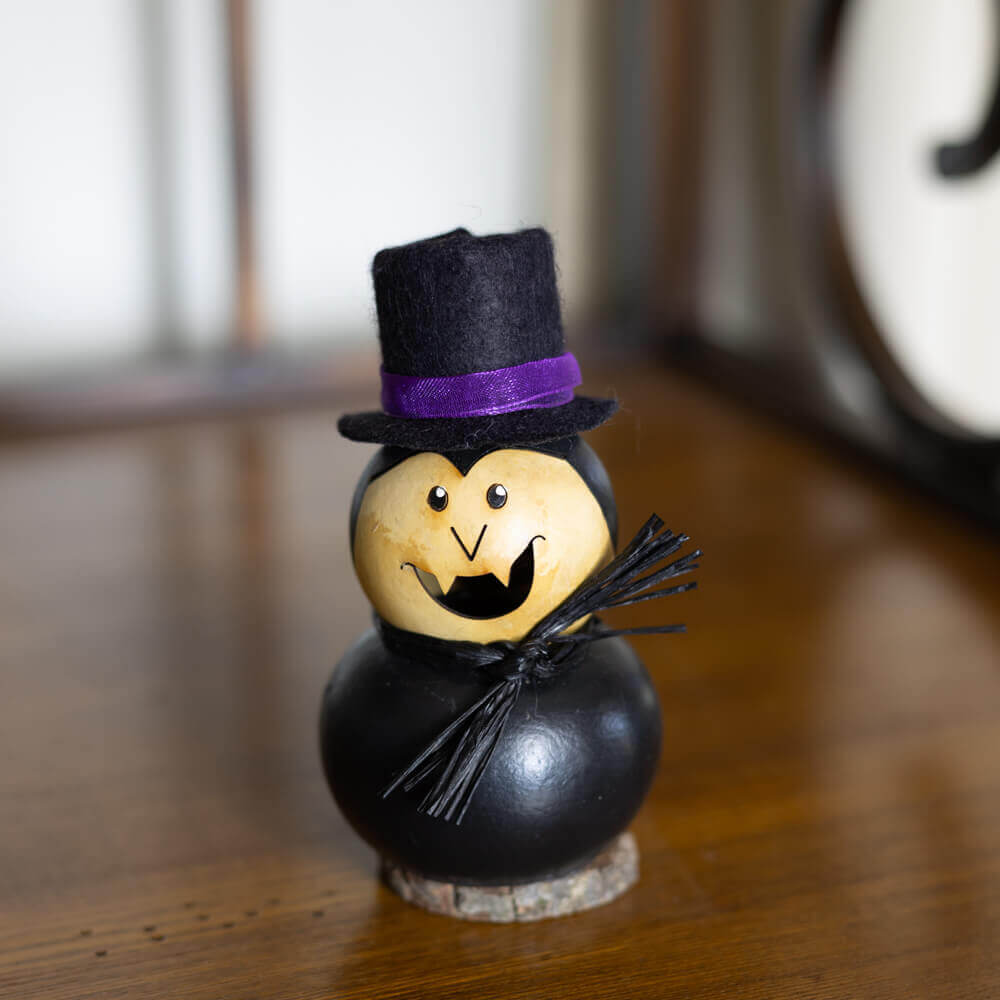 Cinder Dracula Gourd at Meadowbrooke Gourds. 