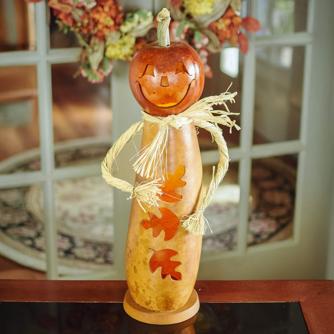 Dexter scarecrow lit gourd at Meadowbrooke Gourds