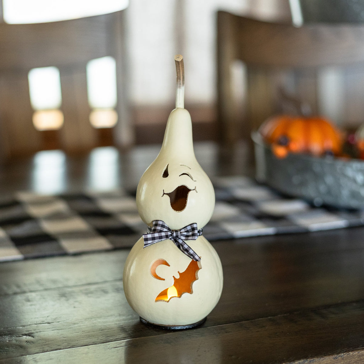 Jake Miniature Winking Ghost with Black/White Bow front view at Meadowbrooke Gourds.