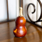 Killian Minatare Jack-O-Lantern Gourd side view at Meadowbrooke Gourds. 
