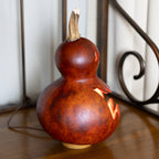 Killian Large Lit Jack-O-Lantern Gourd Side View at Meadowbrooke Gourds. 