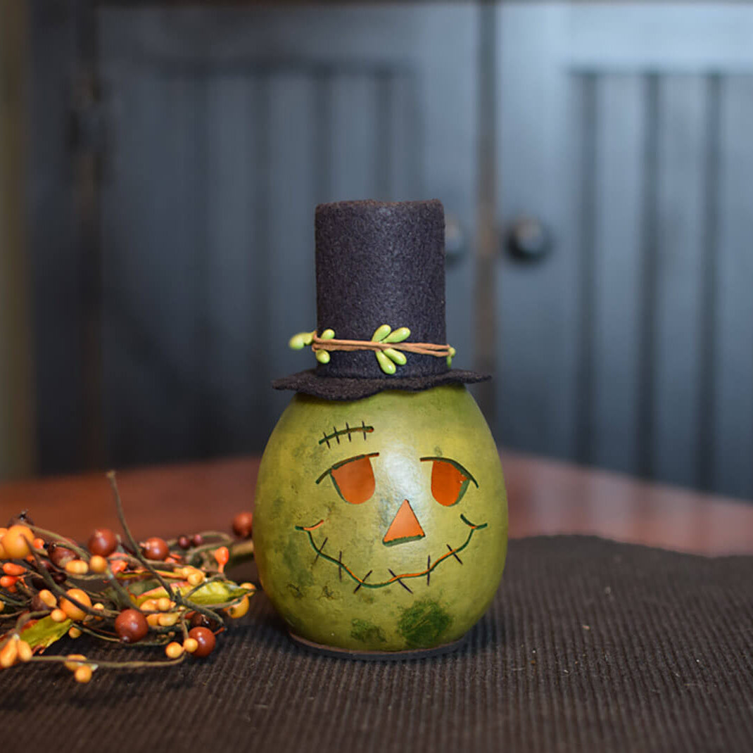 Miniature green Frank gourd at Meadowbrooke Gourds.