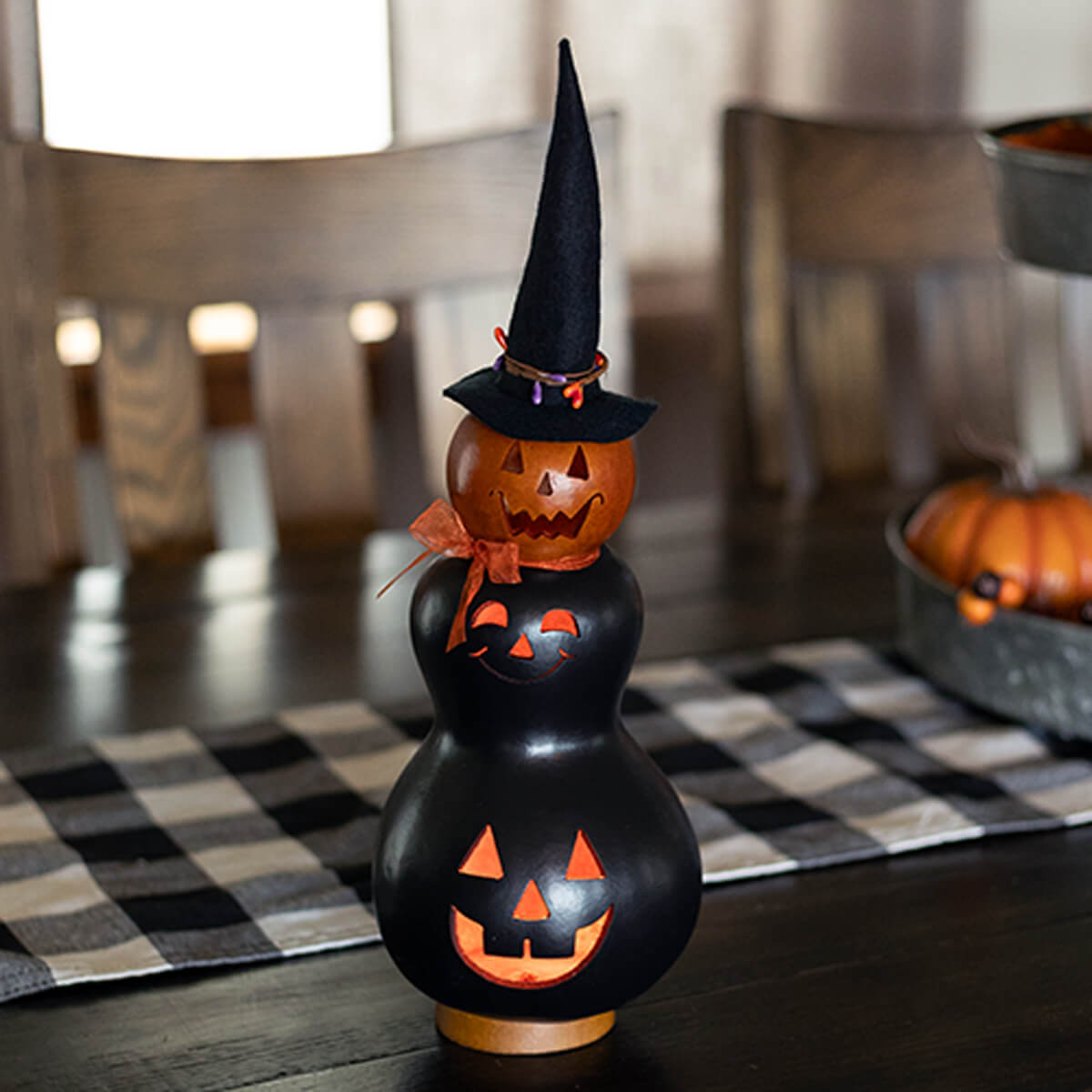 Reba Black/Orange Small Tall Lit Witch Gourd at Meadowbrooke Gourds. 