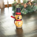 Tiny Caramel Colored Snowman Gourd at Meadowbrooke Gourds. 