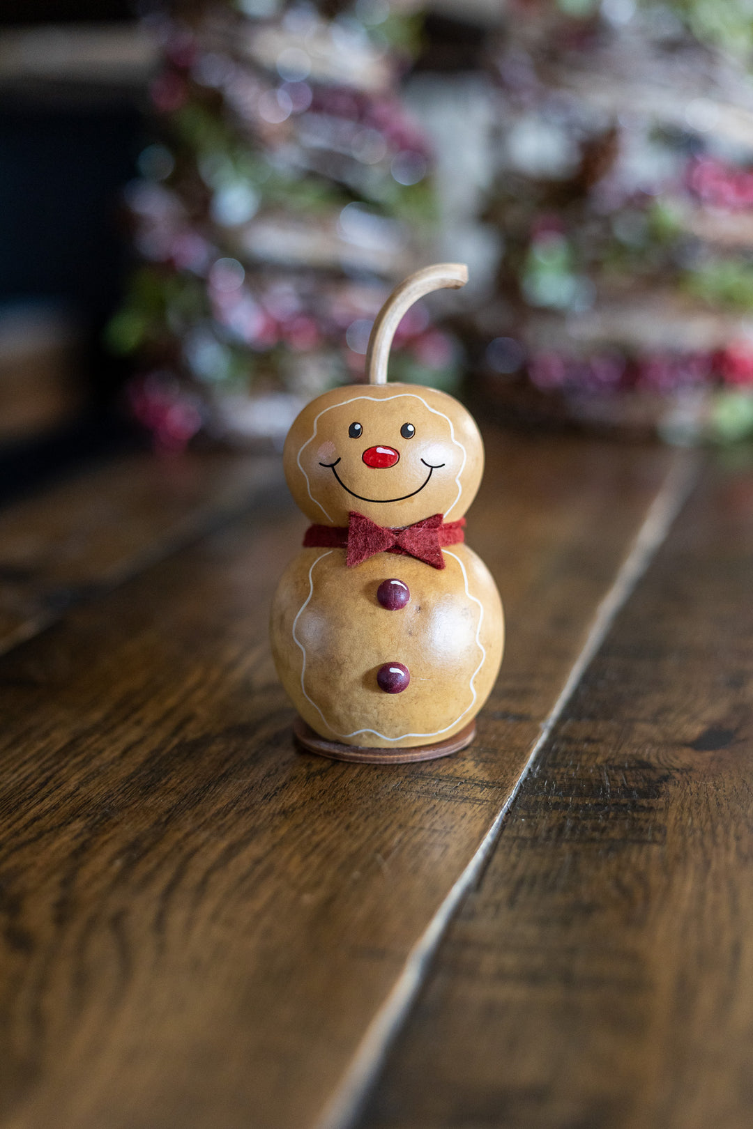 Tiny Gingerbread Man Gourd at Meadowbrooke Gourds. 