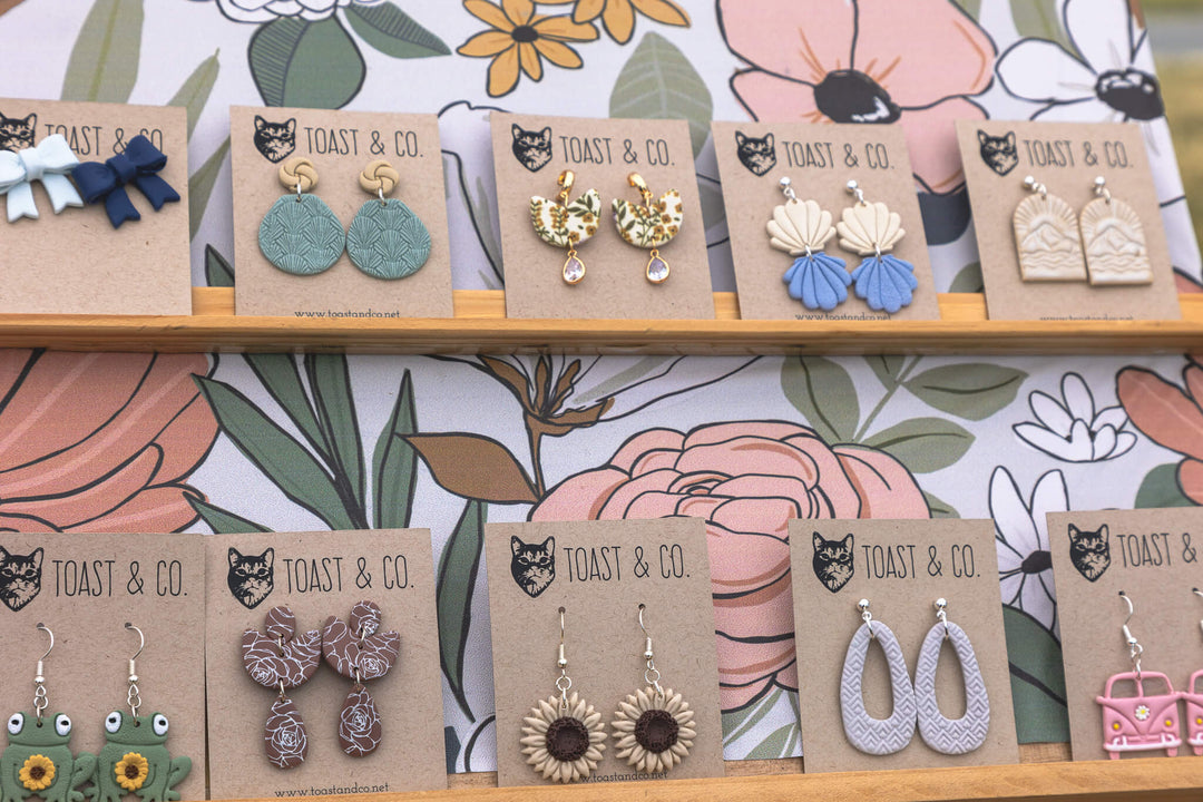 Toast & Company displaying 10 pair of earrings