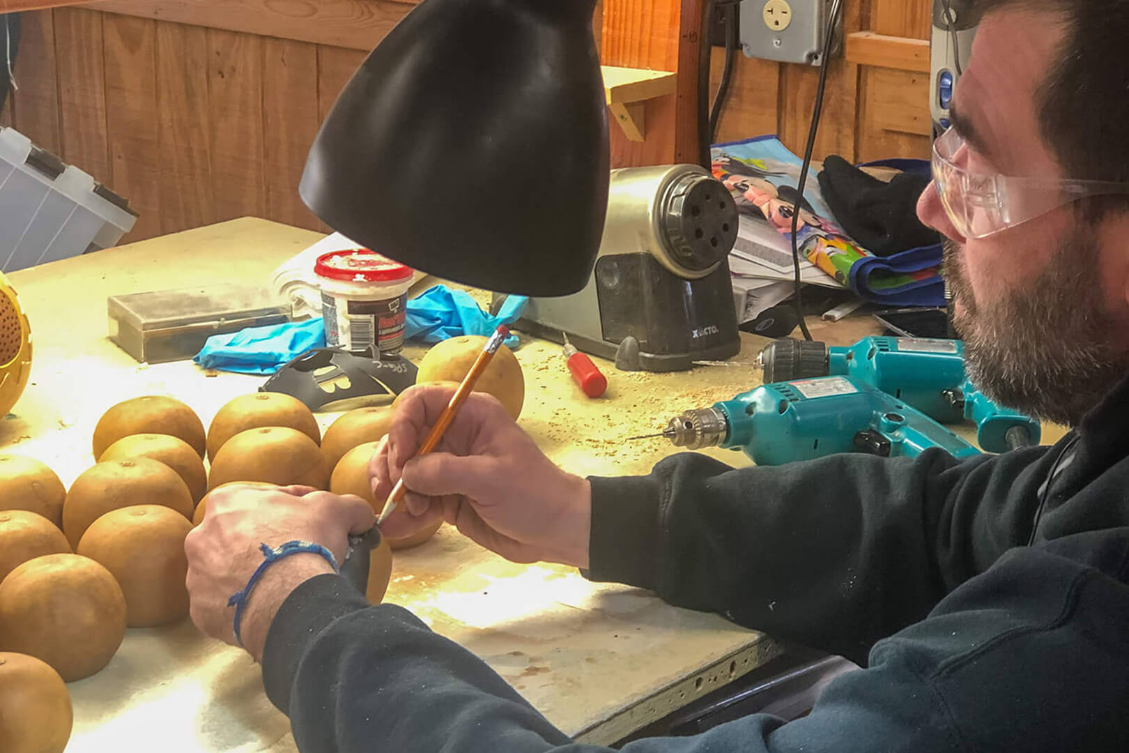 Male employee at Meadowbrooke Gourds