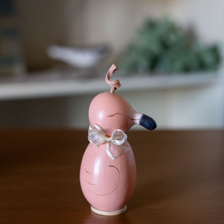 Flamingo Extra Tiny Gourd Side View at Meadowbrooke Gourds. 