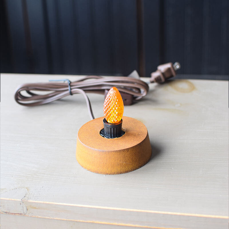 Light Base with Orange LED Bulb. 