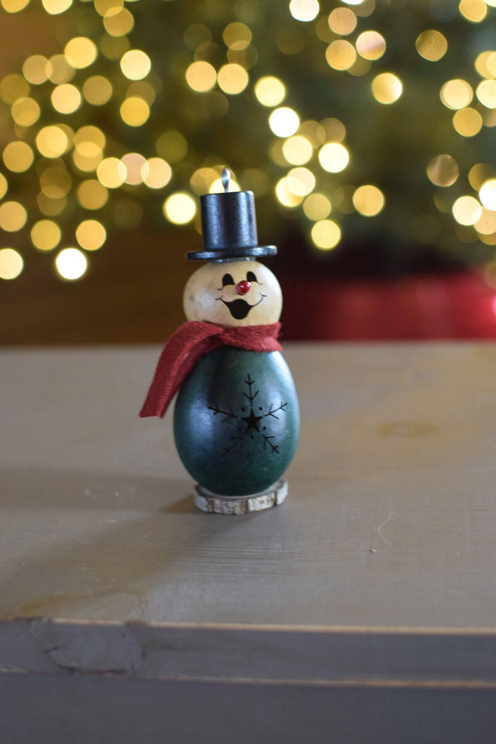 Little pinewood snowman gourd at Meadowbrooke Gourds