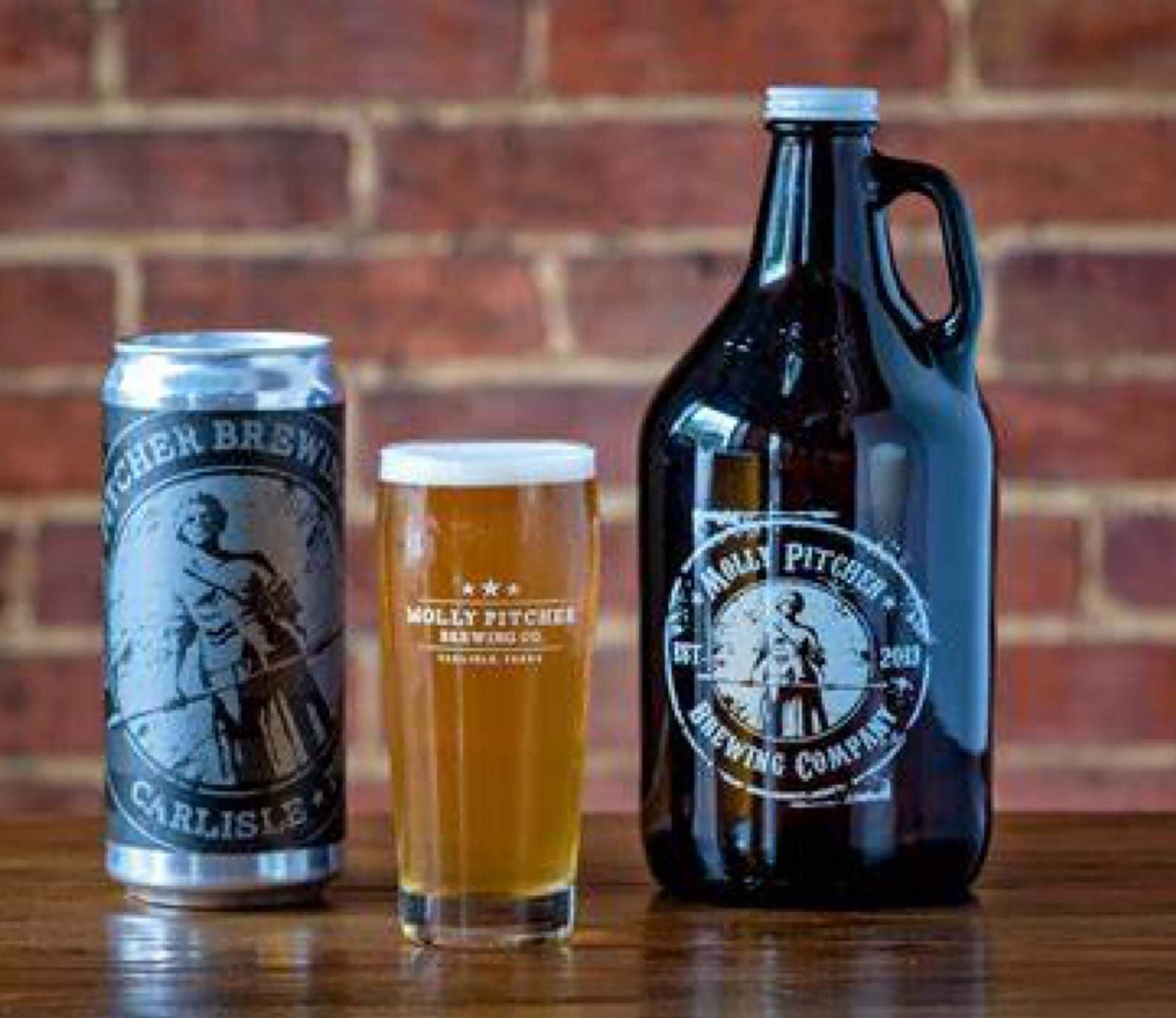 Molly Pitcher Brewing Company growler and glass of beer