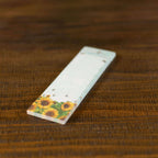 Mystery boo bag stationary item, sunflower with bees notepad.