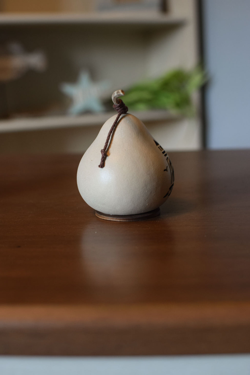 Tiny Light House Gourd Side View at Meadowbrooke Gourds. 