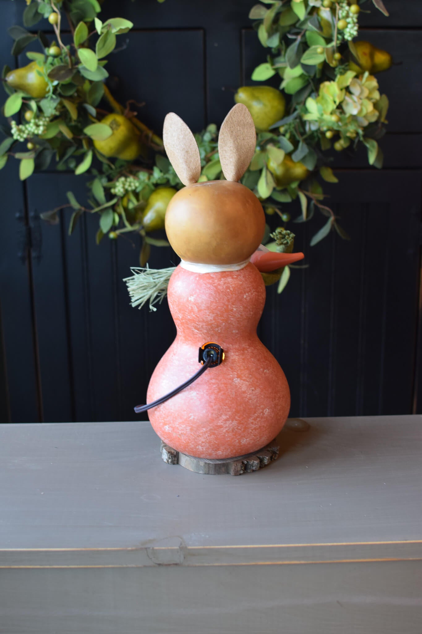 Willow Medium Lit Orange Bunny Back View at Meadowbrooke Gourds. 