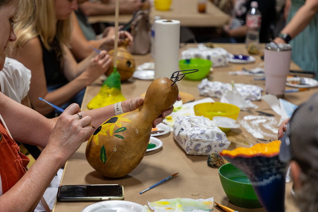 Summer Celebration Painting birdhouses at Meadowbrooke Gourds. 