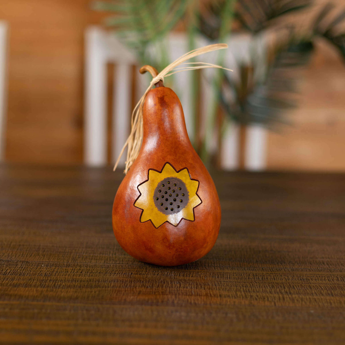Mystery boo bag fall gourd design, burnt orange dyed bottle gourd with dyed yellow sunflower inlay and raffia tied around the stem.