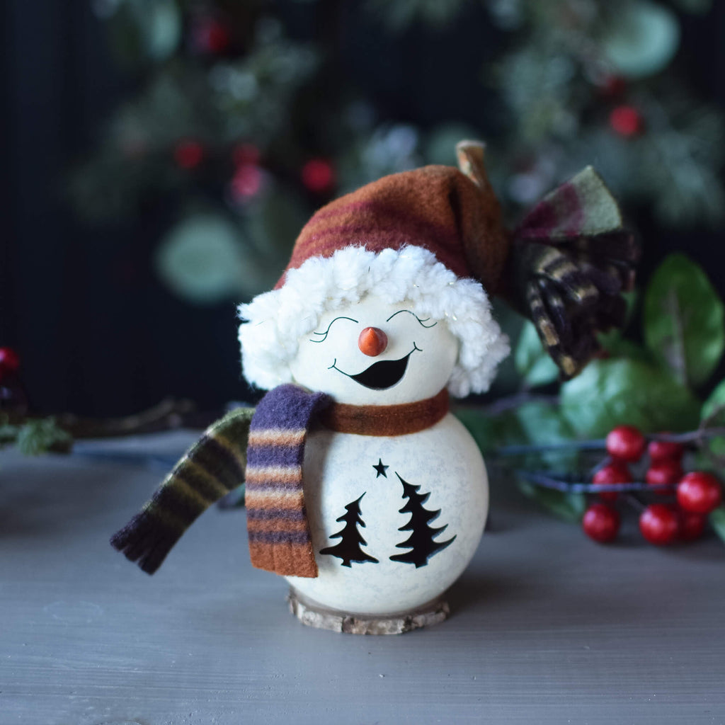 Tiny Everleigh snow girl with a winter scarf and hat, perfect for winter decor, made by Meadowbrooke Gourds