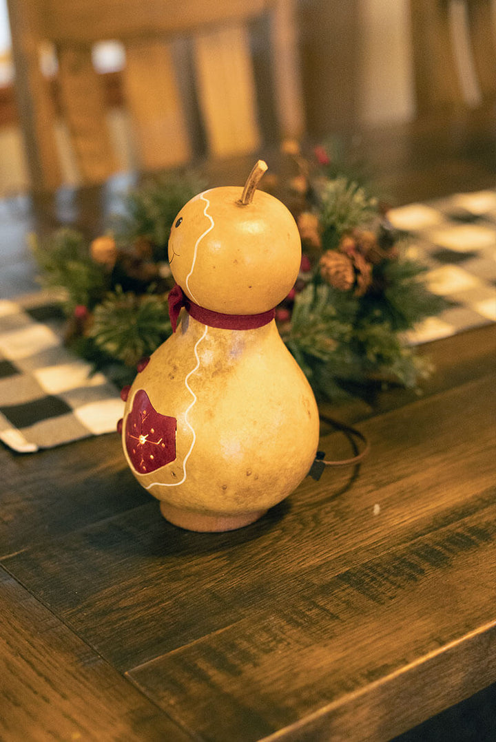 Gingerbread Man Gourd Side View at Meadowbrooke Gourds. 