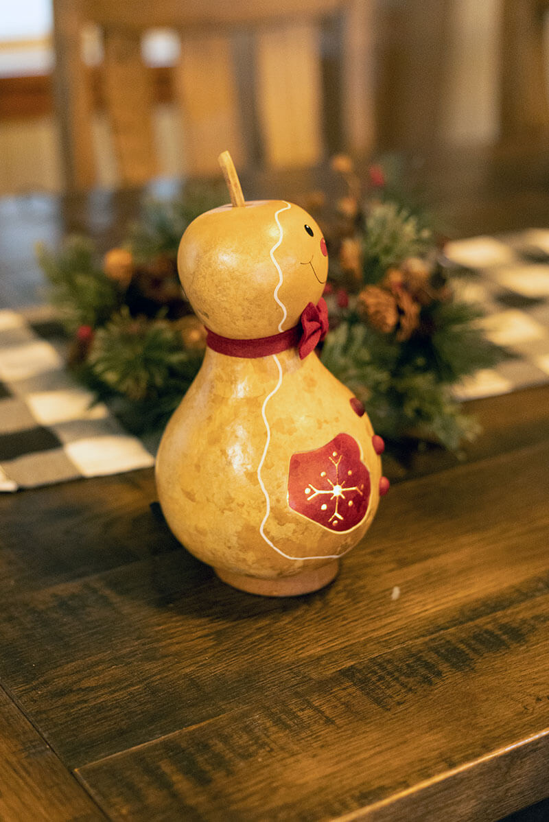 Gingerbread Man Gourd Side View at Meadowbrooke Gourds. 