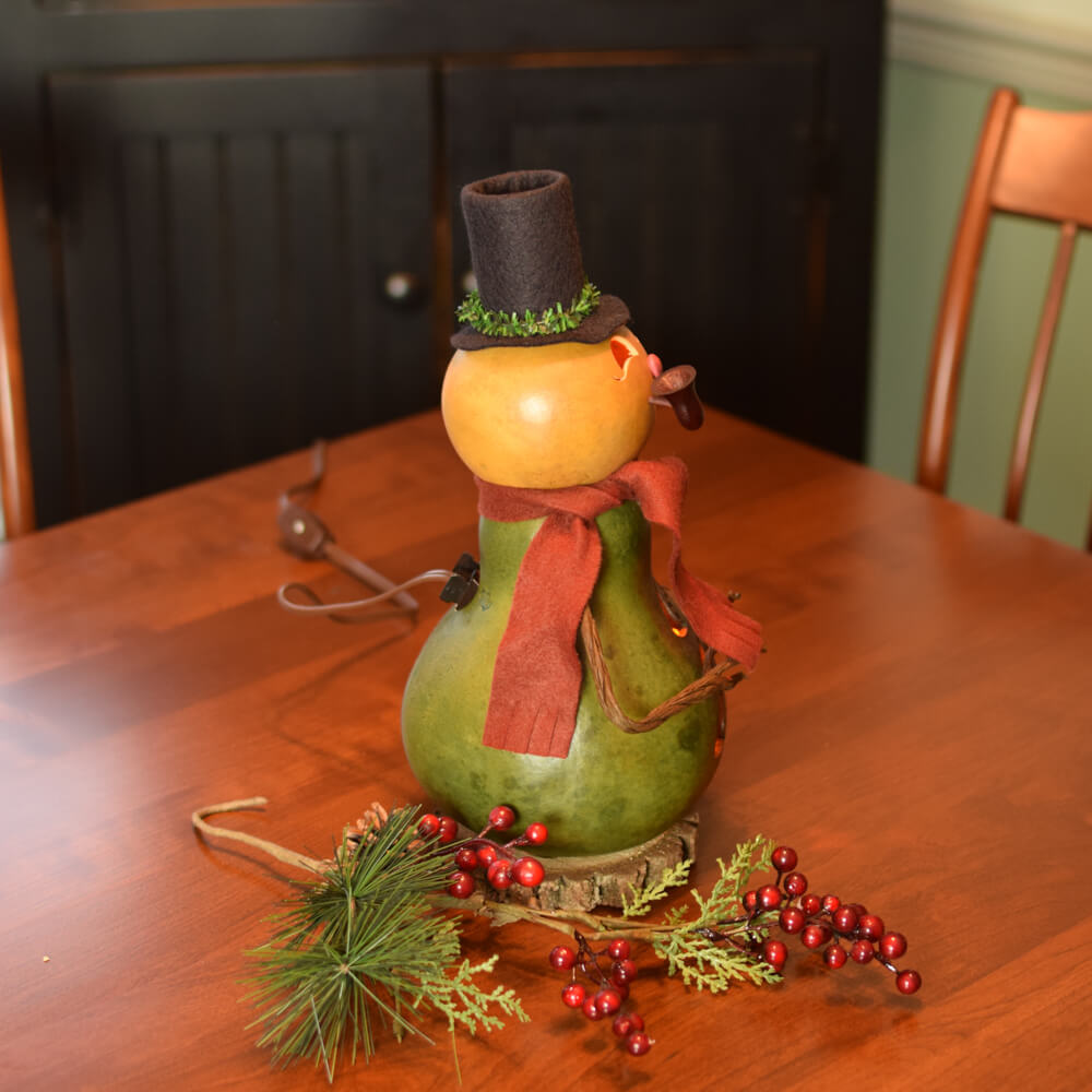 Small Lit Pinewood Snowman Gourd at Meadowbrooke Gourds. Right Side View