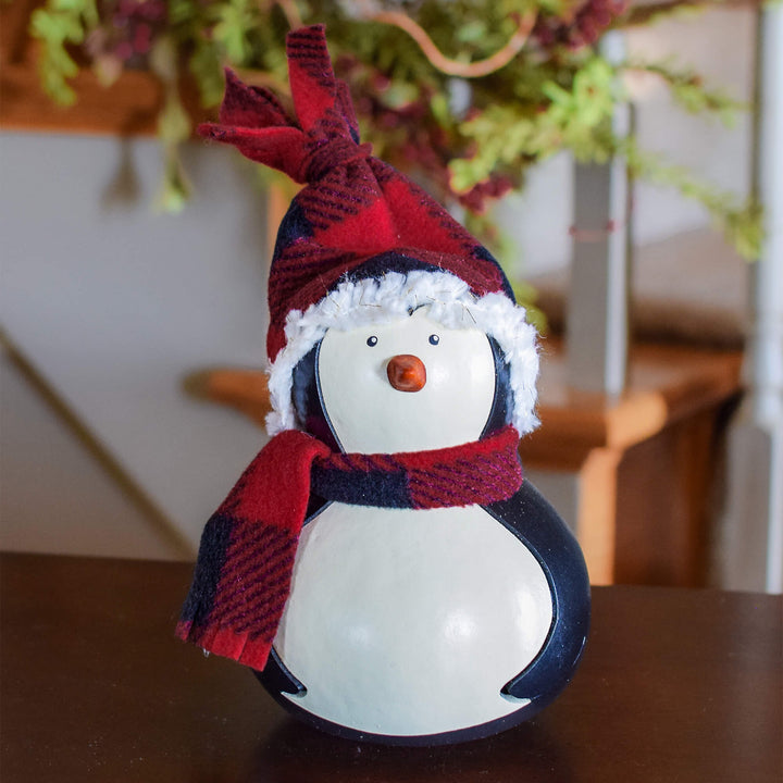 Parkin Girl Penguin Gourd Winter Design that is hand-crafted from a hardshell gourd by Meadowbrooke Gourds