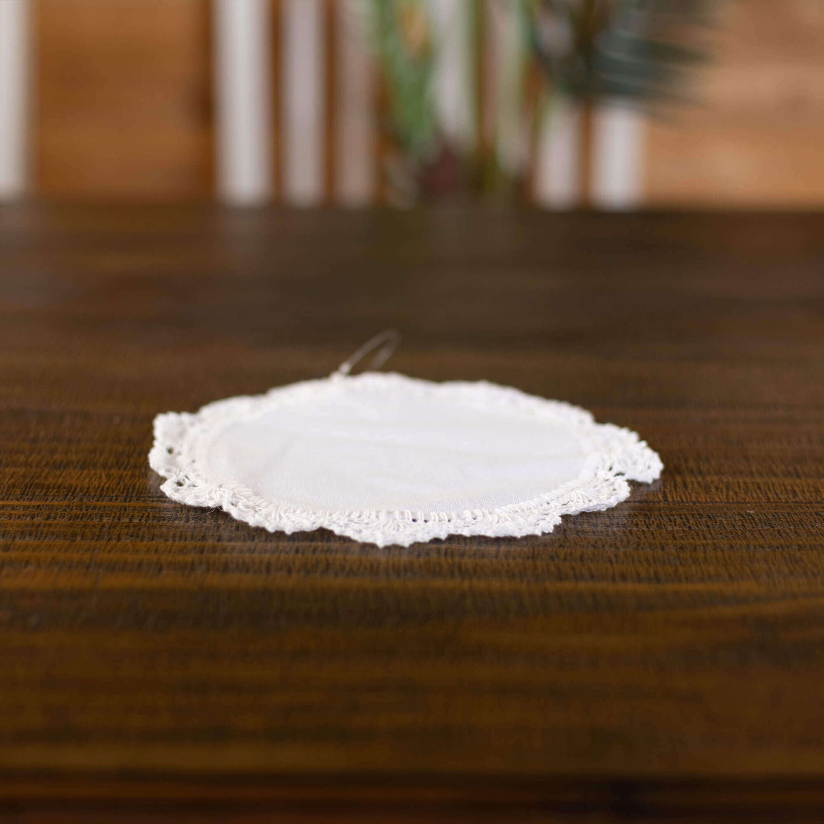 Mystery boo bag decor item, white doily. 