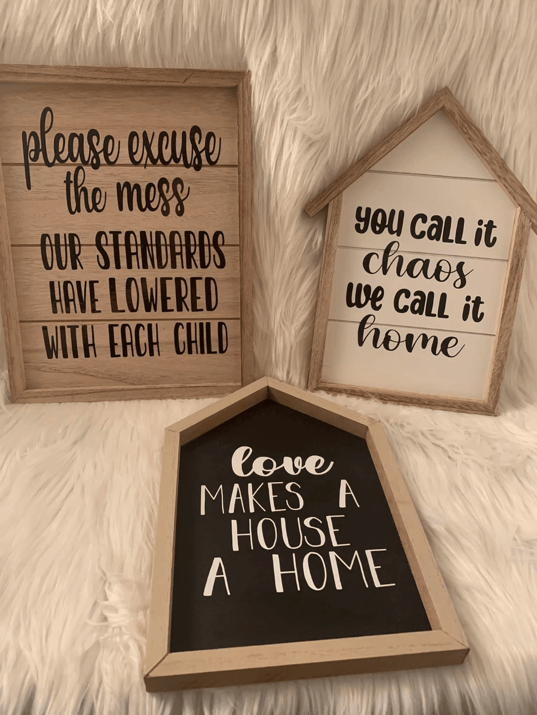 3 signs 1 square and 2 shaped like a house
