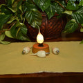 Decorative light bulb in a base