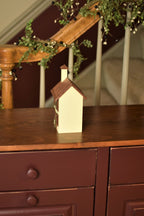 Wooden four window house side view
