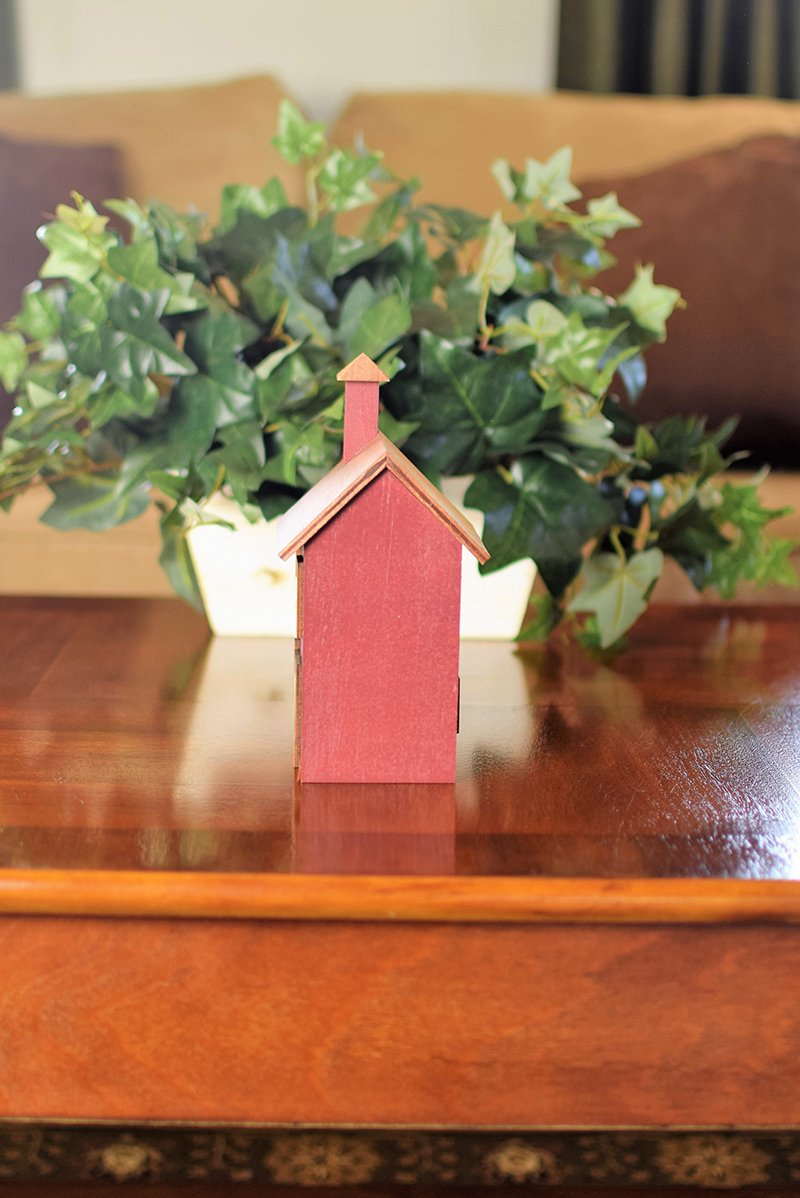 Right Side of four window wooden house