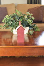 Left Side of five window wooden house
