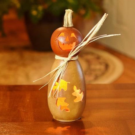 Dexter scarecrow lit gourd at Meadowbrooke Gourds