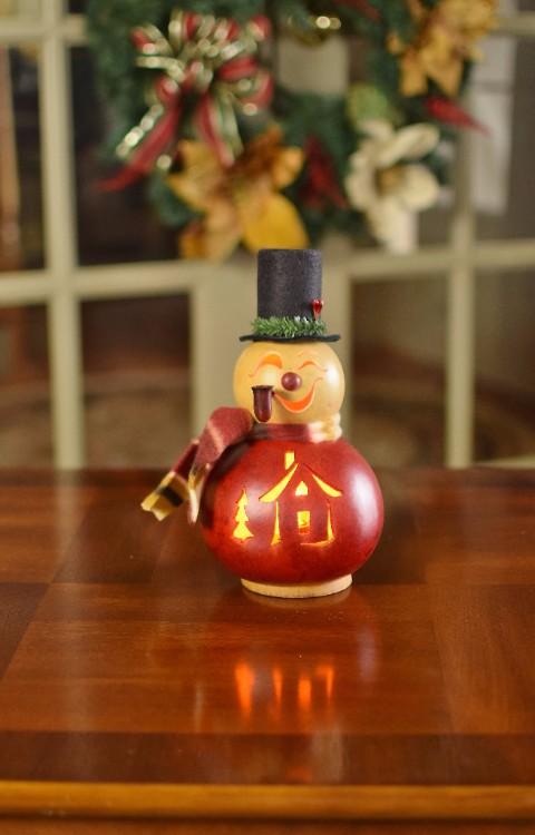 Philip Snowman lit gourd at Meadowbrooke Gourds