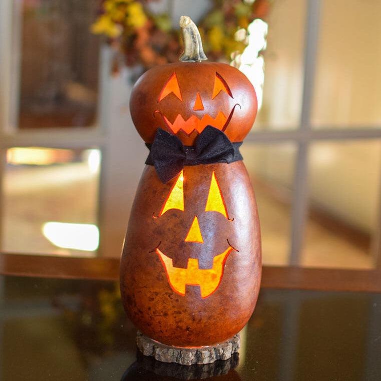 Lit two tier jack o lantern gourd at Meadowbrooke Gourds