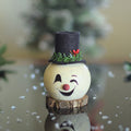 Tiny Clyde snowman head gourd  at Meadowbrooke Gourds